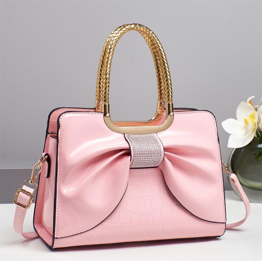 Women’s glossy leather handbag with top handle — medium-structured shoulder/handbag with adjustable strap