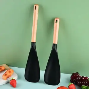 Silicone Cooking Spoon for Nonstick Cookware Heat Resistant Kitchen Spatula with Wooden Handle for Baking and Stirring Ideal for Everyday Cooking