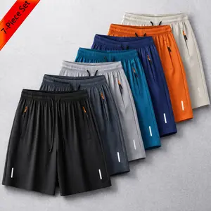 7-pack men’s ice silk quick-dry athletic shorts featuring zippered pockets and contrasting zipper head design; breathable, lightweight ice silk summer shorts for fitness, running, and casual wear—an essential for workouts and comfortable for home wear in