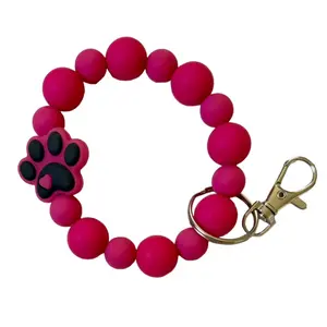 Magenta Paw Print Silicone Wristlet