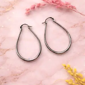 Long teardrop earrings with rhodium plating