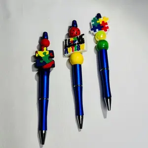 Autism Awareness Beaded Ink Pen - Retractable Twist Design with Silicone & Wood Charms - Refillable Bottom - Smooth Writing Experience - Eco-Friendly & User-Friendly