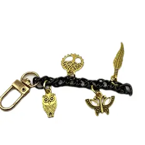 #38 Nature’s Spirit Black and Gold Keychain with Owl Butterfly and Feather Charms for Stylish Accessories
