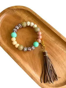 Dusty Diva Wristlet | Western Beaded Keychain Bracelet | Cow Print, Turquoise & Gold | Boho Cowgirl Gift | Tassel Key Ring