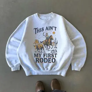 This Is Not My First Rodeo Vintage 90s Graphic Sweatshirt, Retro Western Cowboy Horse Country Unisex Shirt, western clothing, western tops, western outfits women, western cowgirl stuff, punchy western wear, country girl stuff clothing clothes