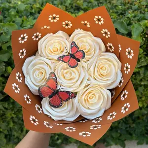 Barrio Themed Bouquet with Orange Butterfly Decorative Flowers in Brown Floral Packaging