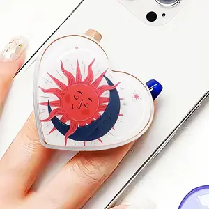 Heart-Shaped Phone Grip with Sun and Moon Design, Cute Collapsible Holder for iPhone, Kindle, iPad | Aesthetic Phone Charm & Accessories for Girls & Women