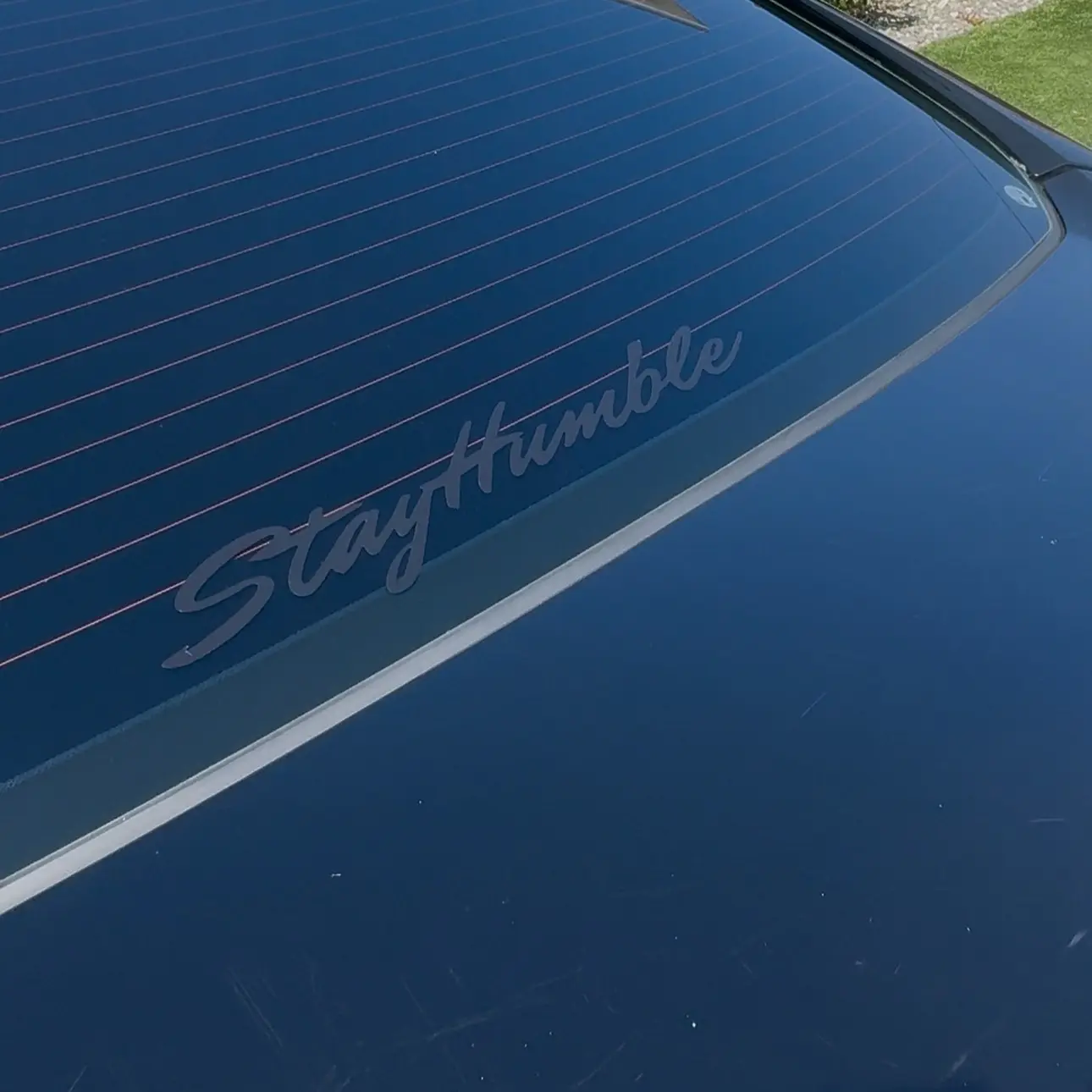 StayHumble Windshield Banner - High-Quality Vinyl, Weather & Fade Resistant, Easy Install, Universal Fit for Most Cars