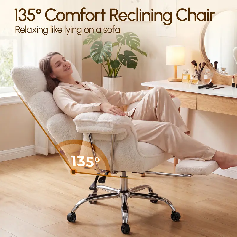 Woman reclining in CoziDesk chair at 135 degrees with footrest extended