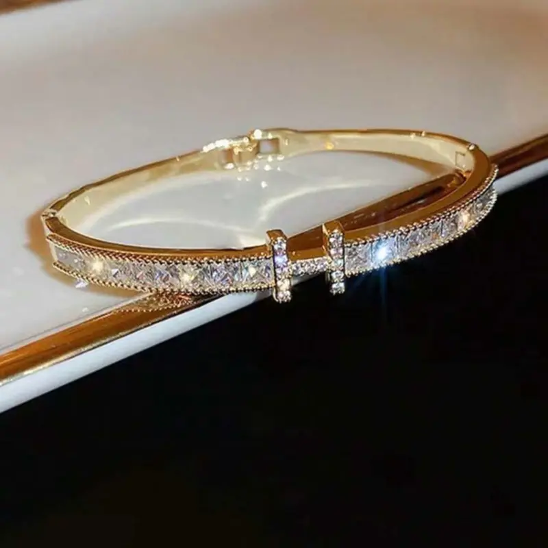 Single Gold Rhinestone Studded "H" Bangle Bracelet with Elegant Design and Sparkling Stones