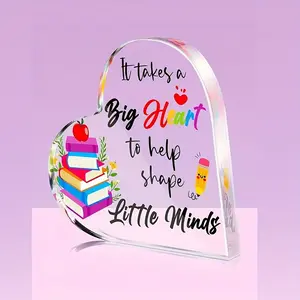 Retro-style two-dimensional acrylic paperweight for teachers, featuring the heartwarming message "Use a big heart to help shape small minds," is the perfect gift for a teacher's birthday or graduation. It is suitable for home and office desk decoration