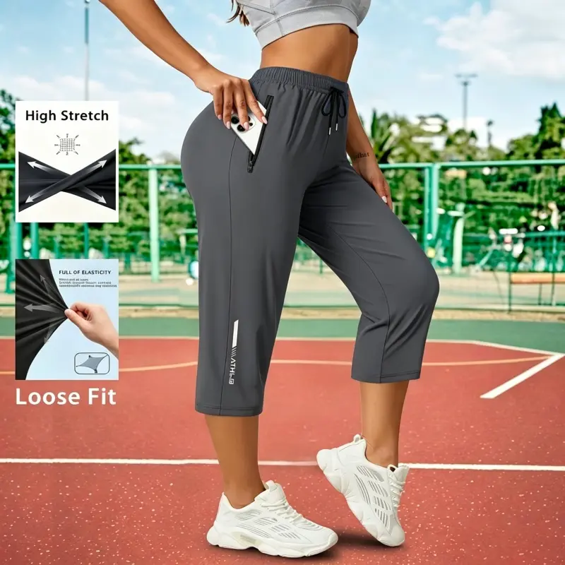 Women’s summer fashion casual stretch solid-color capris pants with a drawstring waist and zippered pockets, reflective stripe print, suitable for outdoor leisure in summer, sports, gym workouts, and everyday stylish outfits.