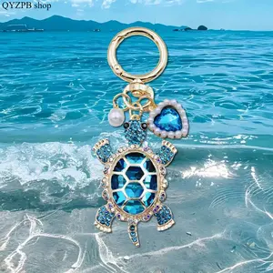 Women's Ocean-Style Turtle Keychain with Pearl Heart Charm - Cute Sea Turtle Bag Charm Key Ring, Aesthetic Marine Animal Accessory, Trendy Beach Decor, Friendship or Mother’s Day Gift for Backpacks & Purses
