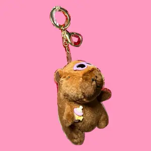 Capy Keychain - Adorable Brown Plush Toy with Pacifier Charm for Bags and Keys