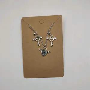 Heart Locket Necklace with Key Earrings Set - Silver Finish, Key Charm, Key and Earring Design