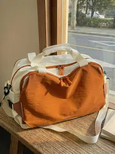 Niche design fashionable  simple  casual and versatile, personalized and creative contrast travel bag, multi-layer wide shoulder strap adjustable portable messenger bag, suitable for business trips, etc. Fashionable Duffel Bag Travel Essentials Bag