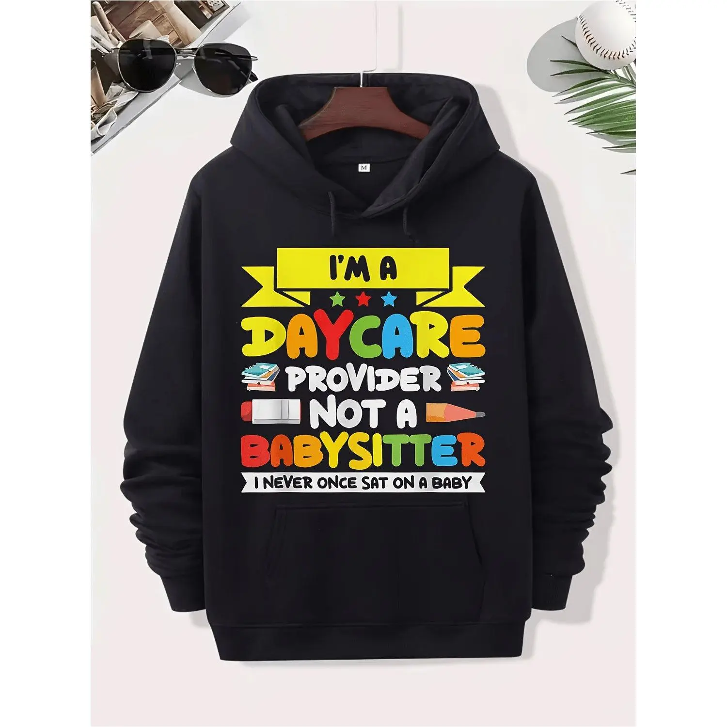 Funny Daycare Slogan for & - "I'm a Daycare Provider" -Themed Hoodie Sweatshirt Pullover with Kangaroo Pocket Casual Teacher Gift Machine Washable Sitting Apparel