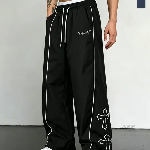 Men’s casual straight leg pants featuring side stripe letter print and an elastic waistband; suitable for sports and leisure, street fashion style, ideal for dancing and everyday commuting—an essential piece for summer travel outfits.