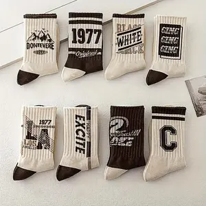 5 pairs of men's retro inspired socks vintage letter patterns neutral earth tones comfortable athletic fit perfect for outdoor activities basketball sports durable knit fabric for long lasting wear