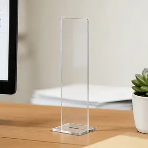 A detachable transparent memo board with a memo message board bracket, available in black and transparent colors, is an office desktop accessory. Suitable for vertical adhesive paper currency display rack
