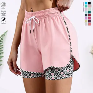Women’s athletic shorts with an elastic waistband, camouflage color-block design, and built-in lining; suitable for outdoor activities, running, sports, and casual wear. Women’s shorts, summer shorts, summer clothing, summer vibe.