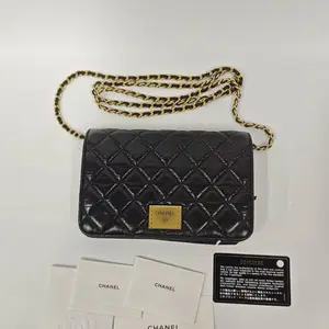 Pre-owned France Crossbody Bags Chanel — WOC with Large Black and Gold Plaque（SZ H06469）