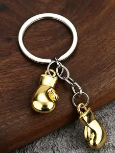 A fashionable mini boxing glove double button keychain with a hardcore metallic texture, making every day full of strength and personality. Suitable for daily commuting, casual dressing, birthday gifts, and men's gifts