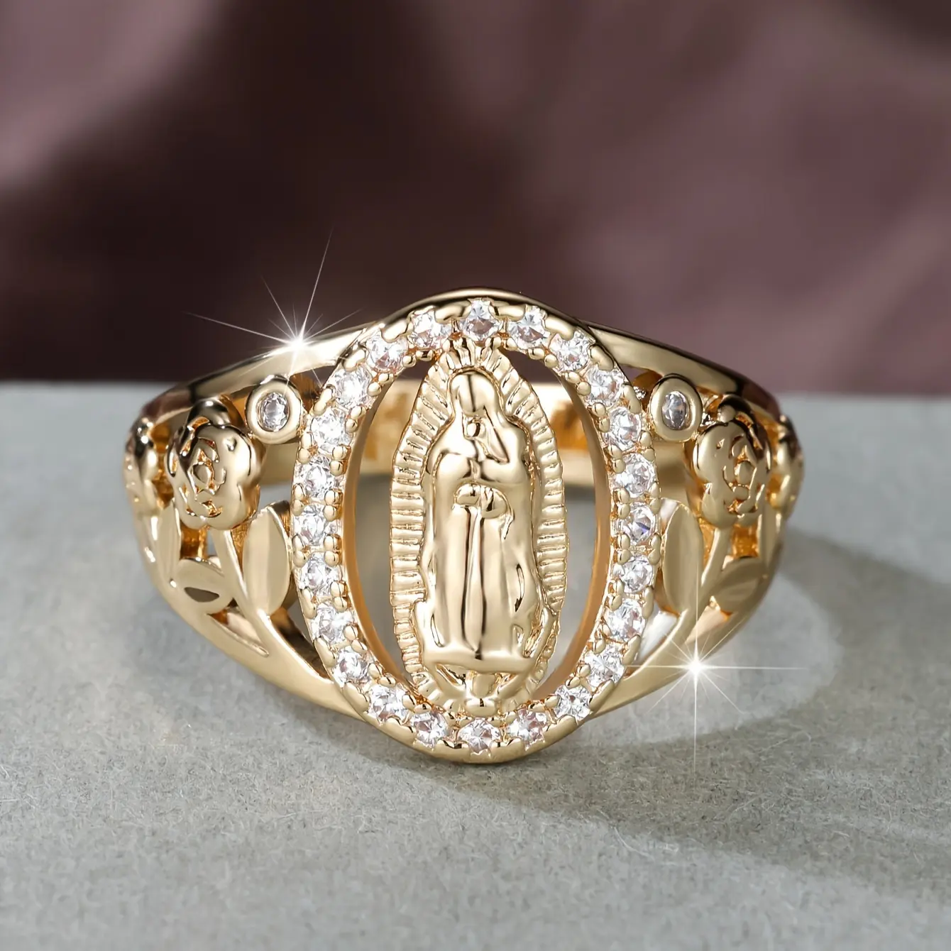 Exquisite ring with a golden hue, adorned with sparkling zirconia stones - suitable for daily wear or special celebrations