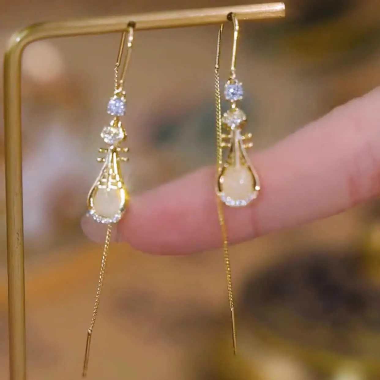Niche Premium-Feel Pipa Tassel Unique Earrings for Women Threader Earrings 2026 Trendy Zircon Elegant Drop Earrings HNAN11