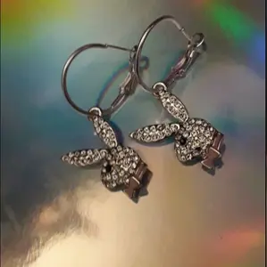 silver plated playboy bunny lever back hoop earrings