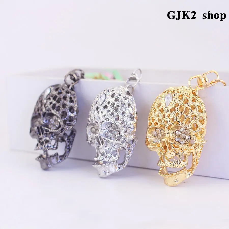 Hollow Skull Keychain with Rhinestones, 4.57" Gold-Plated Gothic Accessories for Women, Anti-Allergy Bag Charm for Party Gifts, 4.57" Long, Crystal Eyes, Zinc Alloy, Crystals, Skull Shape, Eco-Friendly, 1.51Oz (42.7G)