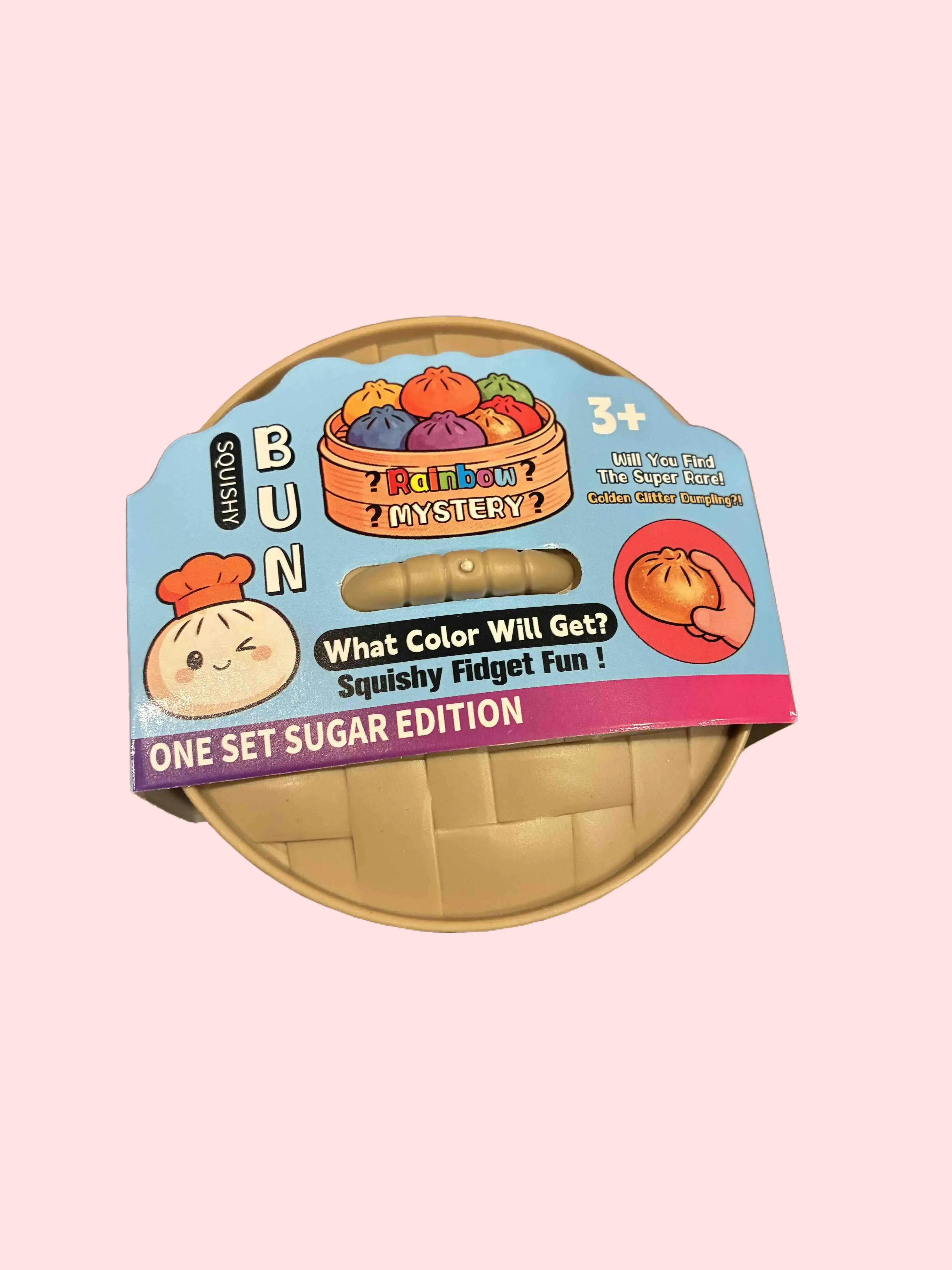 SUGAR DUMPLING SHAPE FIDGET SQUISHY TOY 1 PCS WITH STEAM BOX. RANDOM COLORS. SOFT BUT FIRM, TAKE IT EVERYWEHERE AS A RELAX TOY.