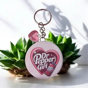 Dr Pepper Girl Keychain with Heart Charm and Logo Design for Fans