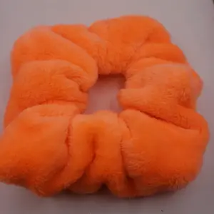 Bright orange fluffy minky scrunchy