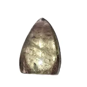 Polished teardrop-shaped natural smoky citrine quartz crystal rutilated quartz.