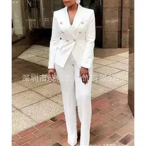 Women’s two-piece set featuring a white blazer with a turn-down collar and matching high-waisted long pants—an elegant work suit