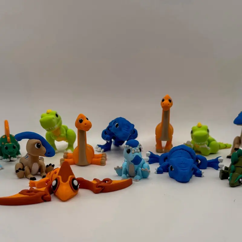 Mystery Mini Dinosaurs Articulated 3D Printed Dino Pack Fully Articulated 2-3.5 Inches Durable PLA Plastic 8 Designs Random Colors Perfect for Desk Fidgets Stocking Stuffers