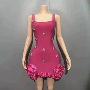 Elegant Pink Dress with Floral Embellishments and Ruffled Hemline for Special Occasions