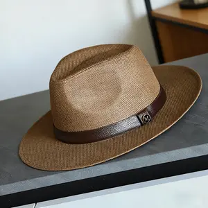 A new spring/summer style straw hat, a cross-border Panama British style sun protection hat, men's belt paper straw beach hat.