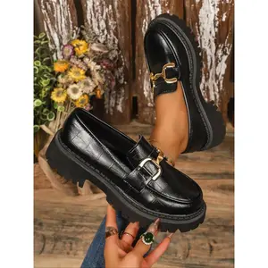 Women’s black faux crocodile leather loafers with gold buckle decoration, chunky platform slip-on footwear—casual round-toe shoes for daily wear, fashionable walking loafers.