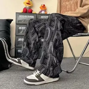 Men’s Japanese vintage corduroy bell-bottom pants — casual straight-leg design with letter print and embroidery, high-street/Instagram sports style