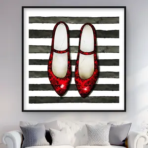 212 MAIN Red Glossy Shoes Wall Artwork - 48x48 in. Black Framed Matted Print, Artistic Striped Backdrop, Vivid Colors for Modern Home Decoration