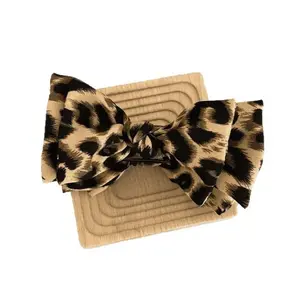 Leopard Print Bow Hair Claw Clip Vintage Style Plastic Hair Accessories for Women with Shark Clip Design Perfect for Braids Buns and Ponytails