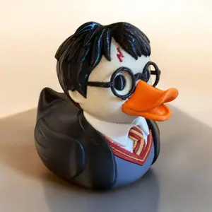 HP Duck Collectible Plastic Figurine for Car Dashboards