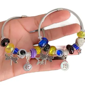 Coralline's Colorful Beaded Dragonfly Charm Bracelet with Silver Cuff and Button Accents for Women