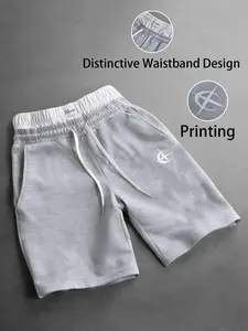 Men’s summer casual athletic shorts featuring a contrast belt and patch design; street-style drawstring shorts with star print; men’s casual shorts with dual belts; gray comfortable sports shorts suitable for everyday wear.