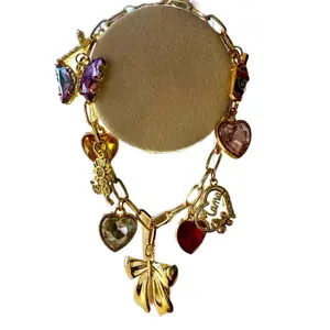 Cali Charm's Custom Charm Bracelet - Gold Plated 18K with 300+ Charms for Personalized Style - 18” with 2” Extender - Easy Care Included Luxurious Finish Durable Construction Giftable Fashionable