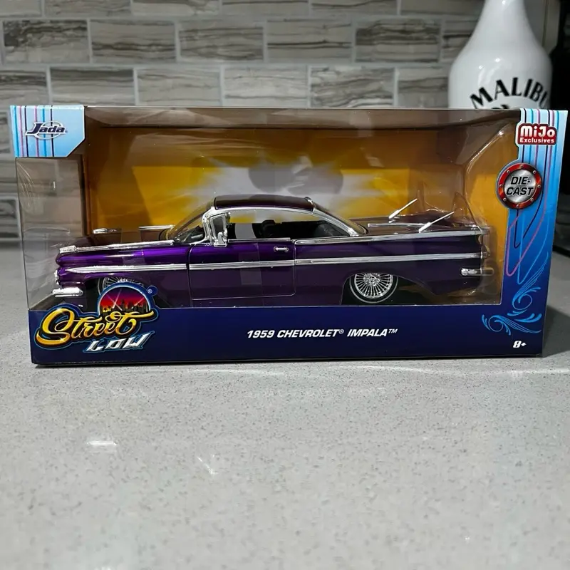 1959 Chevrolet Impala Street Low Sedan with Chrome Lining and Standard Features