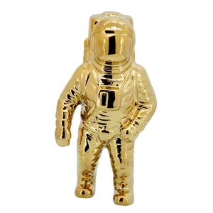 212 MAIN 11 in. Ceramic Astronaut Statuette, Gold Wall Home Decor