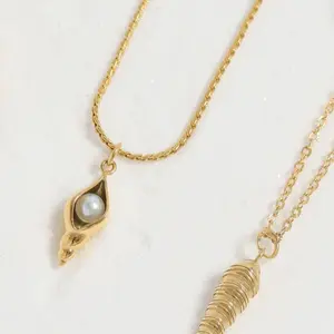 18 Karat Gold PVD Stainless Steel Conch Shell With Pearl Charm